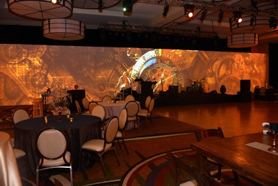 Inside the main reception area, PSAV set up an 80-foot LED screen displaying steampunk-inspired imagery. While eating and mingling, guests also listened to live music from local dance band Static and watched performances from contortionists and Cirque-style performers.