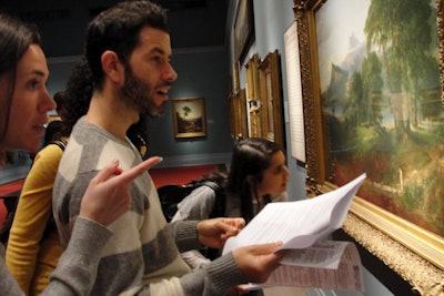 A scavenger hunt team discovers clues in a museum painting.