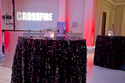 Textured materials like sequined tablecloths complemented the venue's ornate atmosphere.