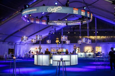 A truss above the central circular bar showed the dates of Dodgers World Series championship wins.