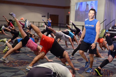 P90X founder Tony Horton roved the floor during his class at the Miami Beach Convention Center.