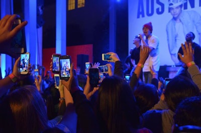 Not only were Austin Mahone's social media channels displayed for guests to encourage interaction, but R.F.I.D. bracelets also allowed the attending teens to share content from the event via Facebook and Twitter. The bands were activated via an email sensor whenever brand ambassadors snapped their photos. Pictures included a branded Aquafina overlay when shared.