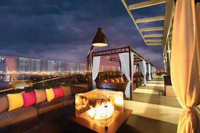 Outdoor cabanas and corner fire-pit seating