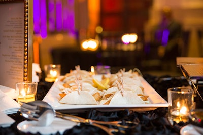 Guests snacked on finger foods like fish tacos, goat cheese and pear quesadillas, and smoked chicken croquettes from Main Event Caterers.