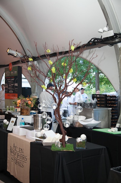 Inside the tent, chefs spruced up their stations with ornaments such as branches and dangling candles.