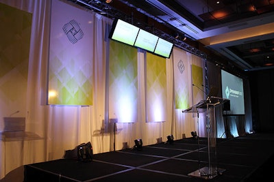 Fortune 500 corporate conference with stage set and design