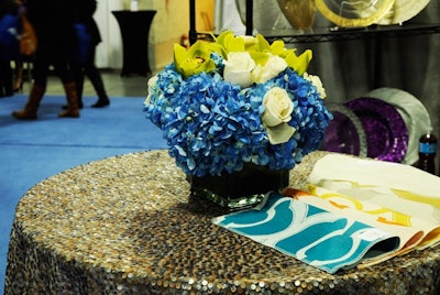 When it comes to linens, sequins are hot—BBJ Table Fashions showcased its new matte mercury sequin overlay, also available as a table runner. Also on display were fabric samples of the company’s new reversible Miramar linens and napkins, which come in six different colors.