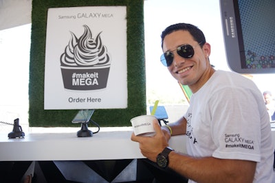 At Samsung's tent produced by Mac Presents near the Downtown Stage, festivalgoers could order free frozen yogurt by keying in their orders using Galaxy Mega devices set up on site.