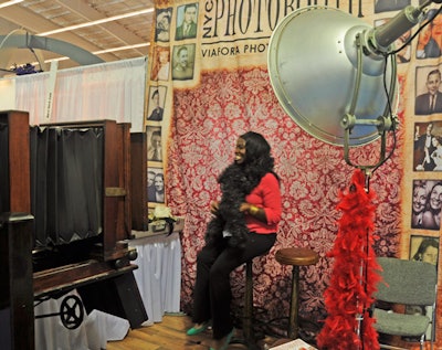 NYC Photobooth presented one of its newest offerings, the Viafora Photomatic Studio, a giant vintage-looking camera that comes with old-fashioned lighting and props for events.