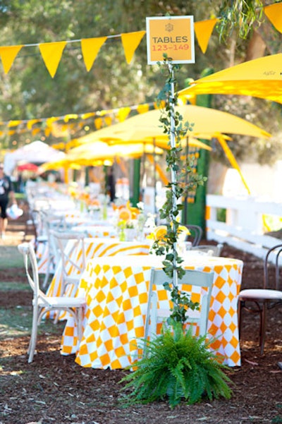 Linens, umbrellas, and bunting were all done in Veuve's distinctive color.