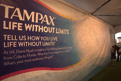 The production costs for the Nyad Swim for Relief fund-raiser were underwritten by P&G brands—including Duracell, Tide, and Secret. Signage appeared in a number of different places, including on swim caps, towels, and a banner by Tampax (pictured), which invited people to write inspiring messages.