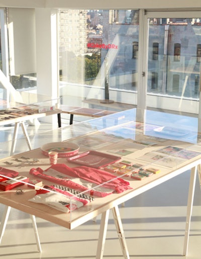 Display cases at the pop-up gallery showed marketing materials from Coca-Cola's archive in Atlanta, including ads, posters, and promotional merchandise.
