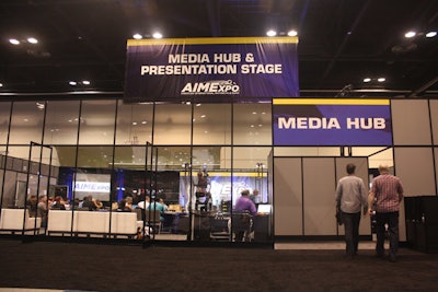 The show's media center, a glass-enclosed room in the back of the show floor, provided work stations, free Wi-Fi, food, and a lineup of presentations from exhibitors.