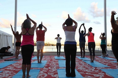 Poolside yoga at the Mondrian South Beach offered a serene workout option overlooking the bay.