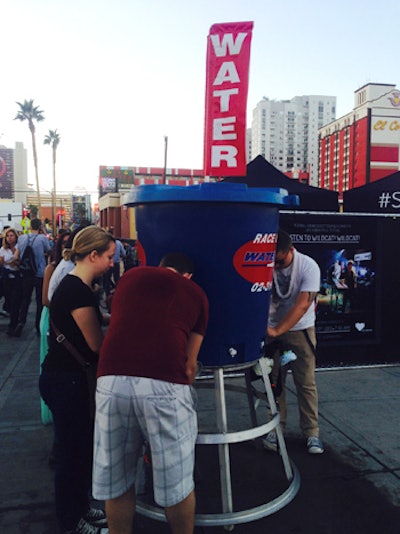 Guests could refill their own bottles and cups for a more environmentally friendly approach to refreshments at water stations set up around the festival grounds. It was an unseasonably warm weekend in town.