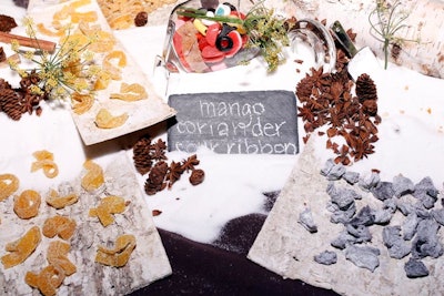 Pastry chef Emma Bengtsson of Aquavit displayed a variety of quirky Swedish candies, including mango coriander sour ribbon and carrot peanut brittle, on a table decorated with pinecones, birch logs, and fake snow.