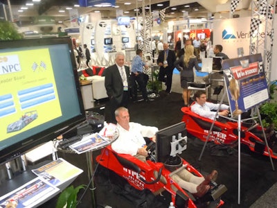 NPC enjoys the VR Race Cars with a custom leaderboard at a trade show in Vegas