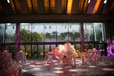 High-top tables draped in dazzling linens