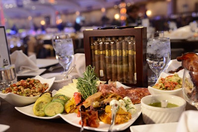 Rather than a traditional plated salad, the Washington Hilton's catering team set each table with an array of antipasti served family-style including white bean salad, Italian meats, cheese, olives, and peppers.