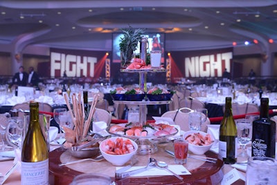 Top sponsors seated ringside started their meals with a tower of sushi, sashimi, and shrimp cocktail.
