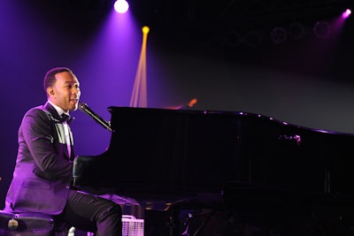 The boxing ring changed to the main stage for a 30-minute set from headliner John Legend.
