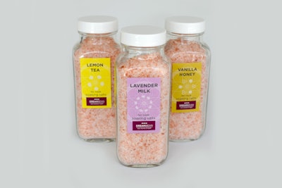 Glass jars of scented, pink Fair Trade Himalayan soaking salts