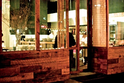 Bowery station façade at night