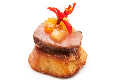 Filet and foie gras on petite French toasts with truffle plum preserves and micro orchids, by Michael Scott Events