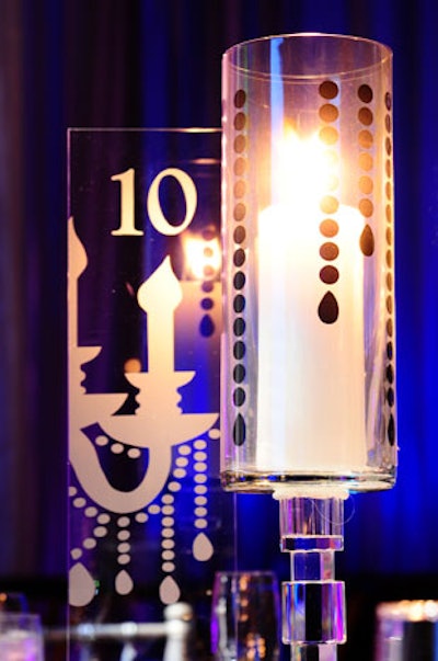 Plexiglas table number displays added a reflective element to the tables at a local college prep school's 75th anniversary gala, held in 2010 at the Westin Diplomat Resort & Spa in Hollywood, Florida.