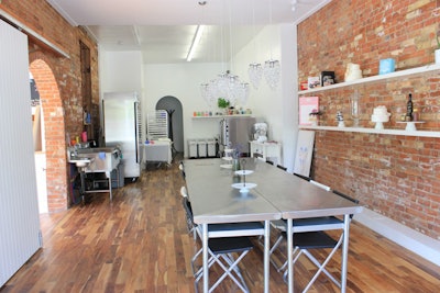 Our exposed brick studio is bright and airy.