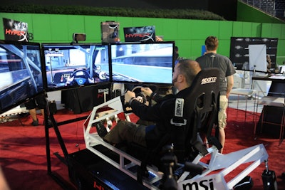 The Hyper X simulated racecar incorporated three screens, an engaged driver, and many curious onlookers.