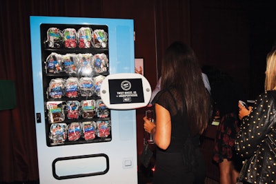 Guests at the ASOS Penthouse in Miami received free swimsuits from a tweet-activated vending machine.