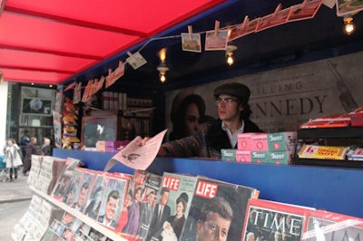 The newsstand was filled with authentic props, including iconic JFK and Lee Harvey Oswald magazine covers from 1957 to 1963, refreshments, and candy. A vintage Zenith TV played NBC news footage from November 1963. Unfortunately, the candy was not for sale.