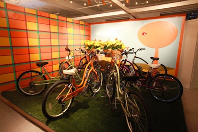 The bright, sunny-day-inspired vignette from Kadlec Architecture & Design had no table at all; instead, a cluster of bikes surrounded a center of flower-filled bike baskets.