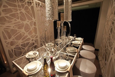 Event Creative designed a festive table, replete with glittering lampshades, for BizBash.