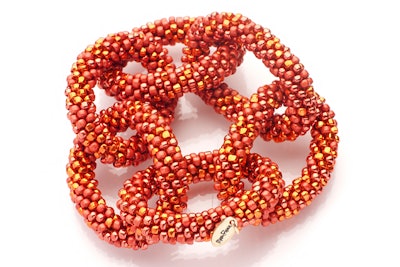Linked bracelet crocheted from spicy colored shiny and matte beads