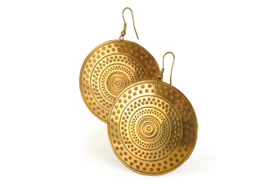 Brass earrings featuring an embossed geometric design in concentric circles