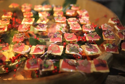 Marc Spitzer of Cherry displayed his big-eye tuna tarts on a barrel topped with glass and filled with a holiday-worthy arrangement of red berries and greenery.