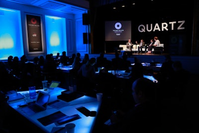 For the Next Billion conference, Quartz filled the ballroom of the Bohemian National Hall with modern, glowing tables.