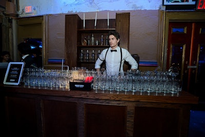 Costumed staffers tended vintage-style bars, which were designed to match the speakeasy theme of the after-party. Absolut, a sponsor of the event and partner of the Lowline organization, served a variety of punches during the post-dinner bash.