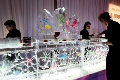 Staffers offered guests caviar and oysters from an ice bar that had brightly colored plastic sea creatures frozen inside.