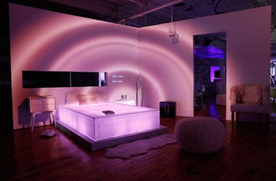 Each room featured a custom piece of LED-embedded acrylic furniture—the bed in the bedroom, for example—that also lit up and pulsed to the beat of the soundtrack.