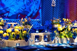 The tables at a graffiti-theme bar mitzvah designed by David Stark Design and Production, held at Center548 in New York, displayed numbers on spray-paint cans.