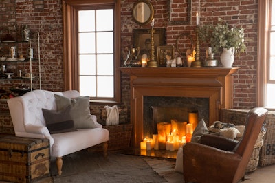 Furnishings, including Lacey white settee and Theodore leather club chair, available in California, from Found Vintage Rentals. Venue: The Loft on Pine in Long Beach, California