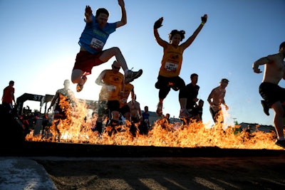 Tough Mudder obstacles are designed to spark photos that participants post and share on Facebook.