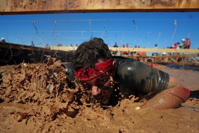 Tough Mudder hires about 10 photographers per event to get at least a dozen photos of each participant.