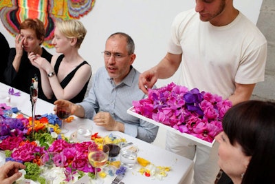 At a 50th anniversary party for Dior Nails, 2013 BizBash Innovator Garin Baura created a performance-art-style centerpiece inspired by artist Holten Rower’s layered, colorful poured paintings: As various courses came out, staffers also served platters of brightly hued flowers which were scattered onto the all-white table. “People were taking flowers and throwing them around—it loosened things up and made the dinner experience more playful,” Baura said.