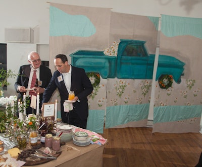 A triptych of a vintage blue pickup truck hung near the main buffet. The image also was used on the event program.