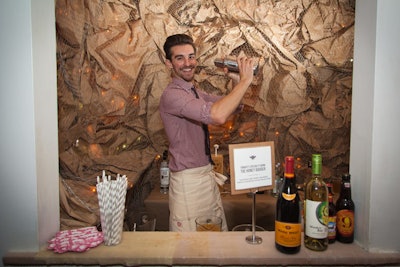 Brown paper crinkled into a chicken-wire frame created a hive-like cave for the bartender, who served drinks using honey from Savannah Bee.