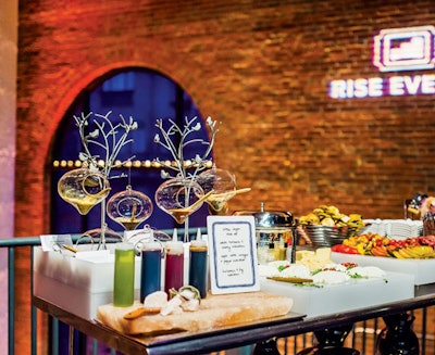 At the February opening of Washington venue the Powerhouse, Design Cuisine added a D.I.Y. element to the cheese and charcuterie buffet: Guests topped their selections with unique spices displayed in suspended glass bowls or flavored olive oils and vinegars housed in squeeze bottles.